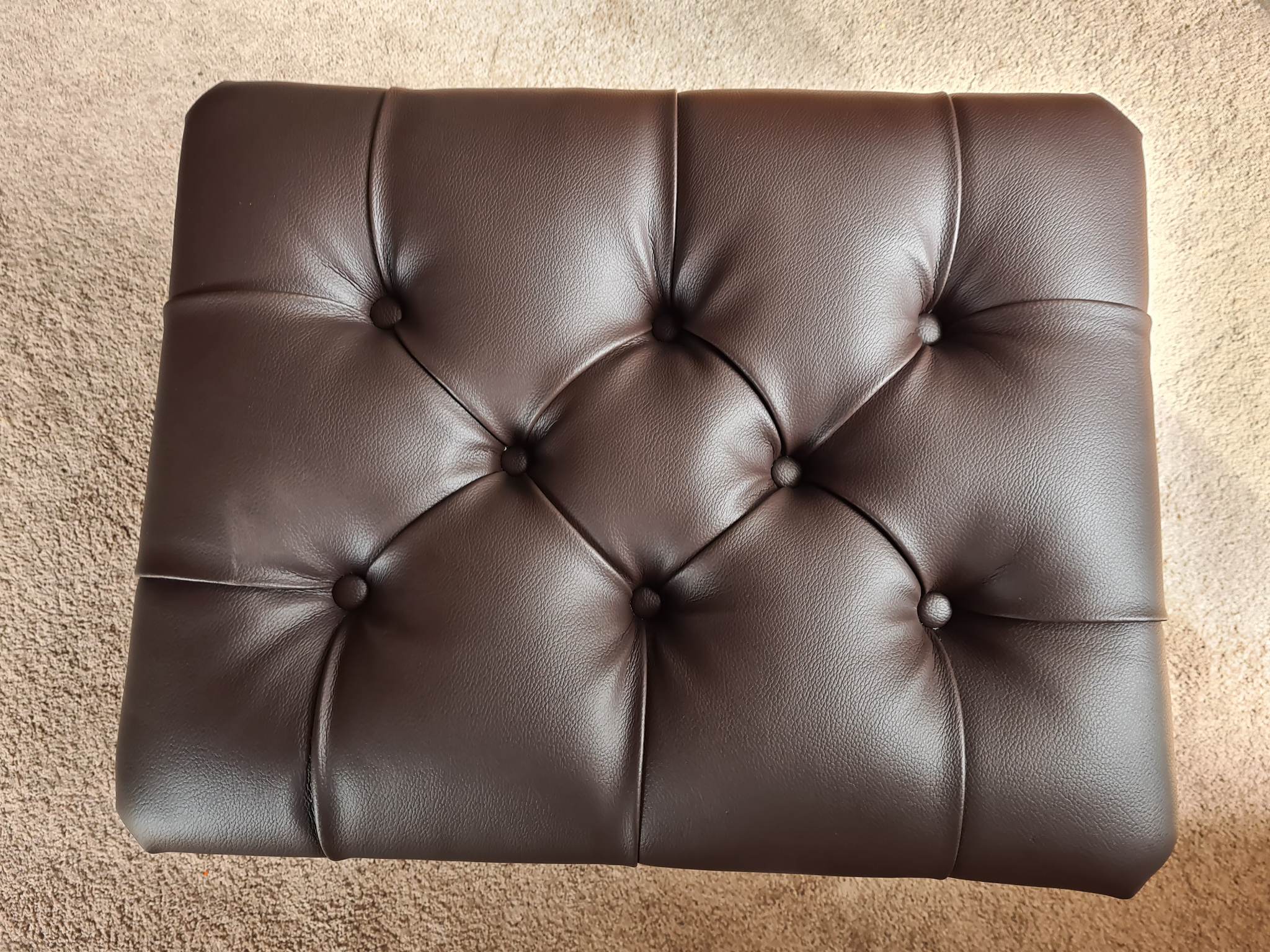 Upholstered dining chair in workshop