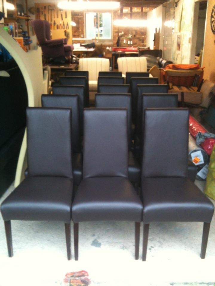 Commercial dining chairs upholstered in leather